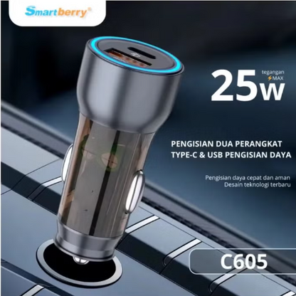 A Smartberry dual-port car charger with one USB-C port and one USB-A port, shown plugged into a car cigarette lighter socket. The charger has a metallic silver body with a clear transparent center section and a blue LED ring around the USB-C port.