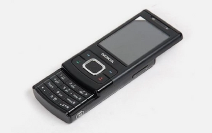 A black Nokia mobile phone with a slide-out QWERTY keyboard and a small screen, photographed on a plain white background.